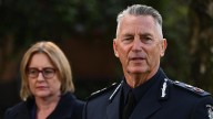 Officers' deaths rock police force, devastate community