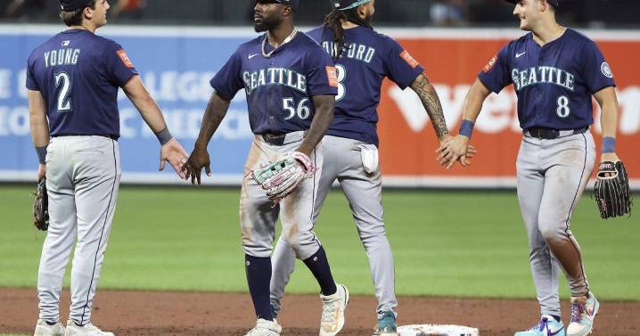 Mariners catch Astros in the AL West after beating Baltimore for their 8th straight win