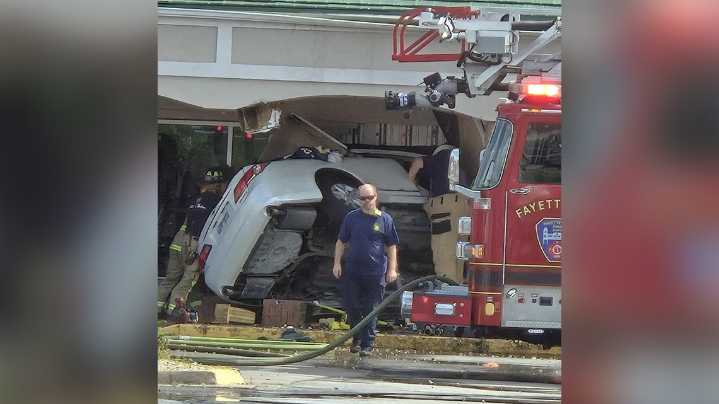 Fayetteville police report vehicle crashed into building