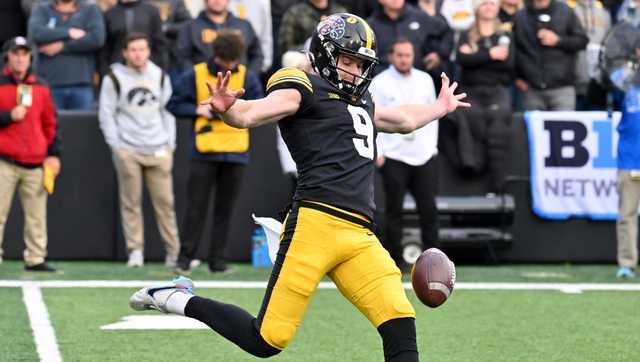 Iowa's Tory Taylor, Reggie Roby make 100