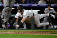 Farmer, Freeman power Rockies' 6-run 8th in a 10-7 victory over the Diamondbacks