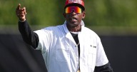 Deion Sanders calls for paying players who reach the playoff and Saban supports the proposal