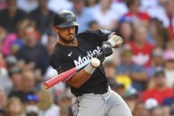 Marlins’ Dane Myers gets heckled by fan at Fenway Park. He hits tying homer and fan ejected