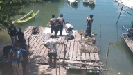 Horror as body of woman found chained ‘by the neck’ and dumped underwater tied down with two dumbbells in Thailand