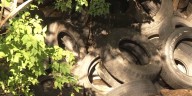 Repeated illegal tire dumping frustrates cleanup volunteers along Little Blue River