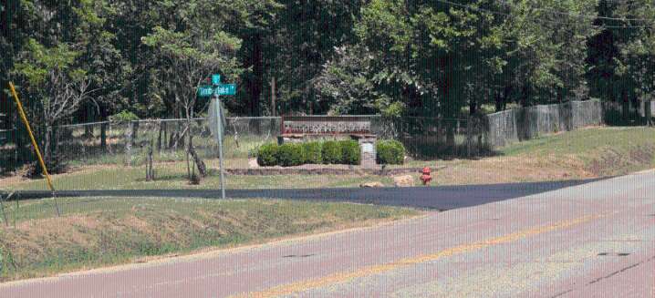 Three in custody after woman’s body found in middle of Edmond road