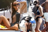 Emily Ratajkowski models cheeky cutout swimsuit on a boat in Italy