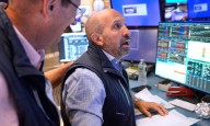 US stocks rally to records on hopes for cuts to interest rates
