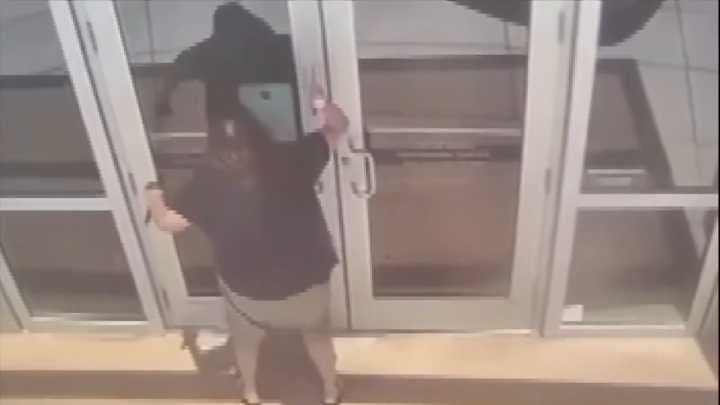 Woman arrested after being seen on video stabbing window, doors of Doral City Hall
