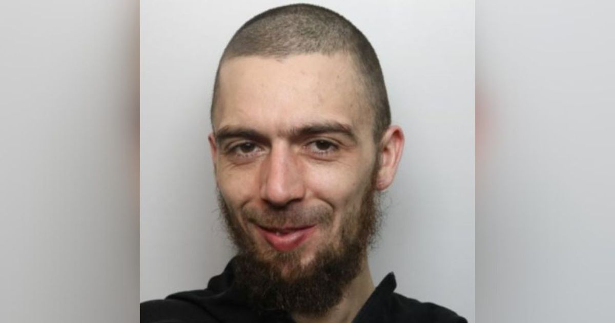 Hunt for wanted man with own nickname tattooed on his arm