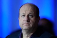 Polis makes moves to balance state budget