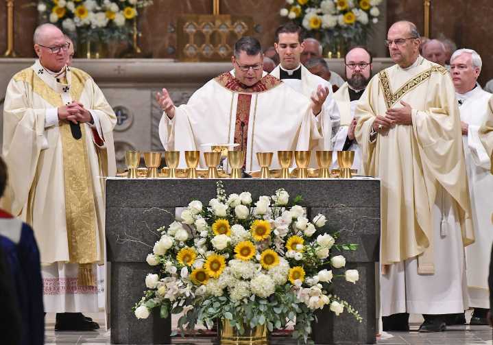 Syracuse’s Catholic bishop takes on the extra job of parish priest for three parishes