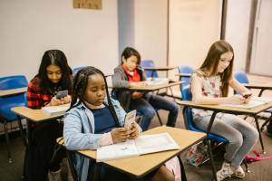 School Phone Bans Are Coming — & They Might Not Be as Helpful as Parents Hope