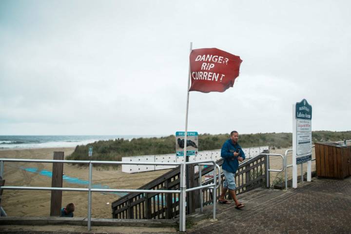 Beach closings and warnings from Hurricane Erin put damper on summer's end for East Coast