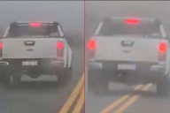 Filmaron camioneta cruzando en doble línea amarilla en medio de una intensa lluvia