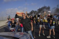 Protesters in Israel demand release of hostages as Israeli strikes kill 16 in Gaza, hospitals say