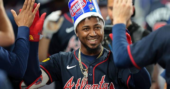 Braves romp Marlins again to clinch series