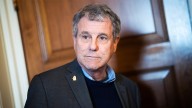 Former senator's PAC shelled out for luxury perks while ignoring $50k tax bill