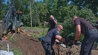 Man arrested after officers find 3,000 pounds of stolen bricks buried in yard