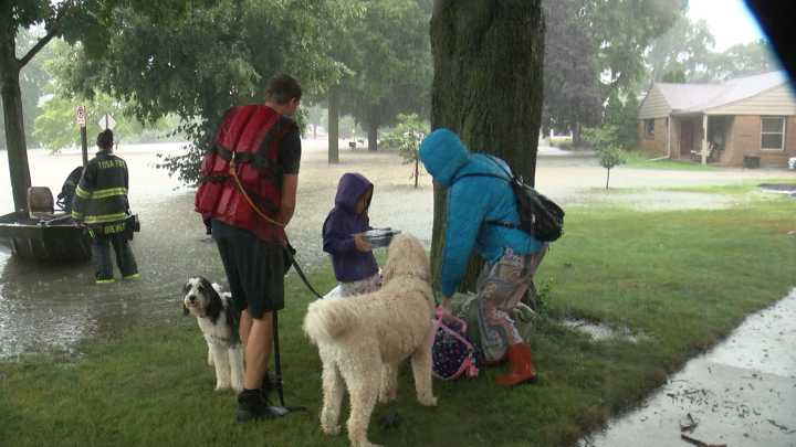 Wauwatosa family, dogs and goldfish rescued from flooded home