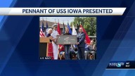 Navy honors Iowa ties with USS Iowa pennant at state fair