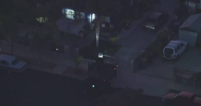 Armed suspect barricades inside Los Angeles home, forcing local school to relocate instruction for the day