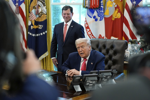 The Latest: Dozens arrested in Washington as White House ratchets up federal police presence