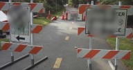 Swastikas found spray-painted on signs at Natick bike path