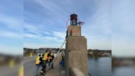 Pennsylvania Rescuers Witness The Shocking Moment A Furry Animal Trapped On A Bridge Pier Falls Into The River