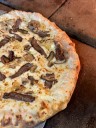 The Western Reserve serves savory steak, wood-fired pizza in downtown Muskegon