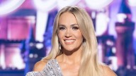Carrie Underwood's natural dark hair and ultra-toned legs shine in animal