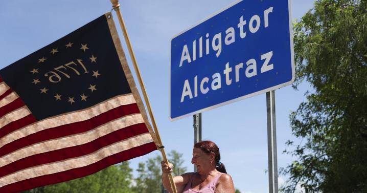 Florida updated agreement on handling detainees at 'Alligator Alcatraz,' but a month after it opened