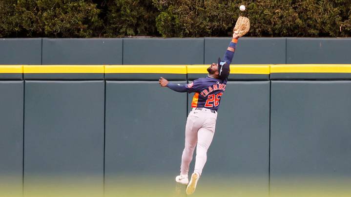 Ex-Mariners OF Trammell crashes into fence in Astros game
