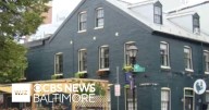 Employees in Baltimore's Fells Point say they were fired after protest over ban of pro