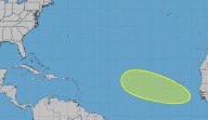 Hurricane center keeps forecast that Atlantic system could brew