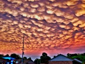Jaws Drop as Clip of Giant Orange Clouds Hovering Just Overhead Goes Viral