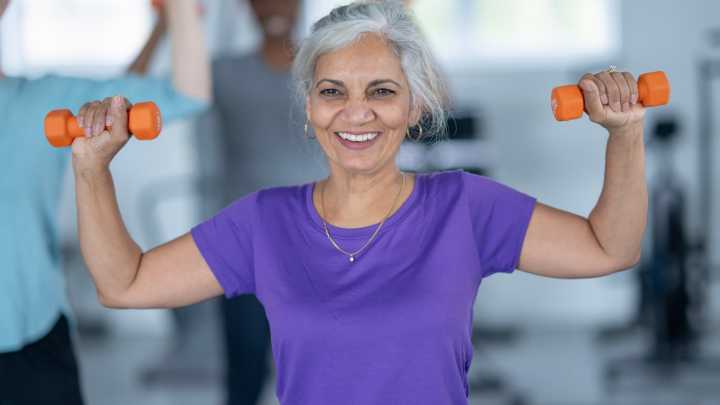 A personal trainer says this is the best workout for building strength if you're over 60 and have limited mobility—all you need is a sturdy chair and a light resistance band