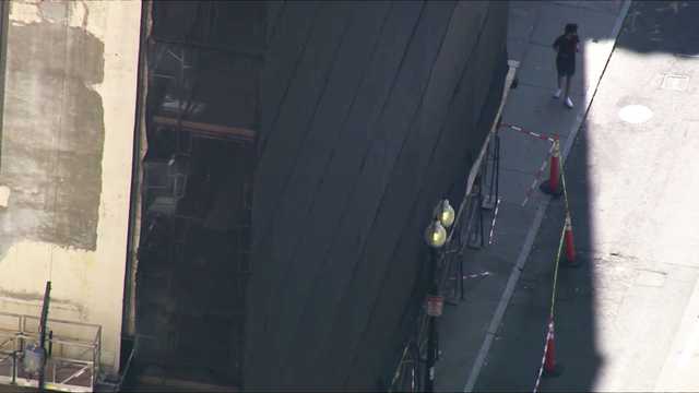 Scaffolding with 5 workers on it hit by truck in downtown Boston