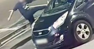 Shocking moment stranger attacks woman's car in Birmingham street 'for the fun of it'