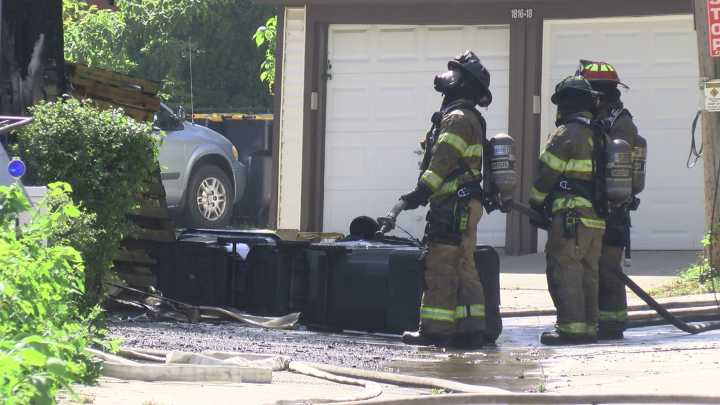 West Allis Fire Department battles garage fire that extended to home; two people displaced