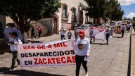 Vestidos de blanco y con fichas de búsqueda de familiares se manifiestan en el país por las víctimas de desaparición forzada