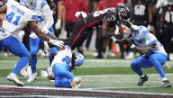 Lions safety Morice Norris arrives at team's training facility after injury