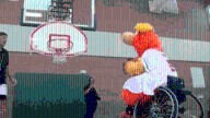 Isotopes play wheelchair basketball supporting Carrie Tingley