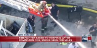 Firefighter taken to hospital after Covington fire
