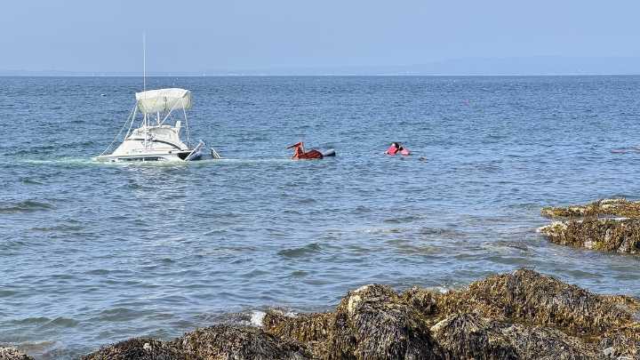 Family used a blow-up paddleboard to flee a sinking boat in Penobscot Bay