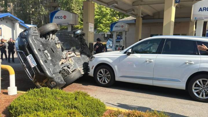 Police chase ends with flipped stolen car in Tukwila