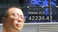Asian shares are mixed, with Chinese benchmarks sinking ahead of Nvidia earnings update