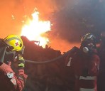 Terrified homeowners jump into the sea to escape approaching Greek wildfires by boat
