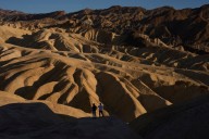 Searing heat draws visitors to California's Death Valley, where it's tough to communicate the risks