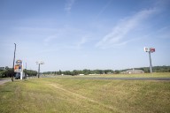 ‘Disgruntled loser’? Winning bidder balks at Mass Pike rest stop suit